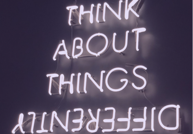 education think about things differently in neon letters